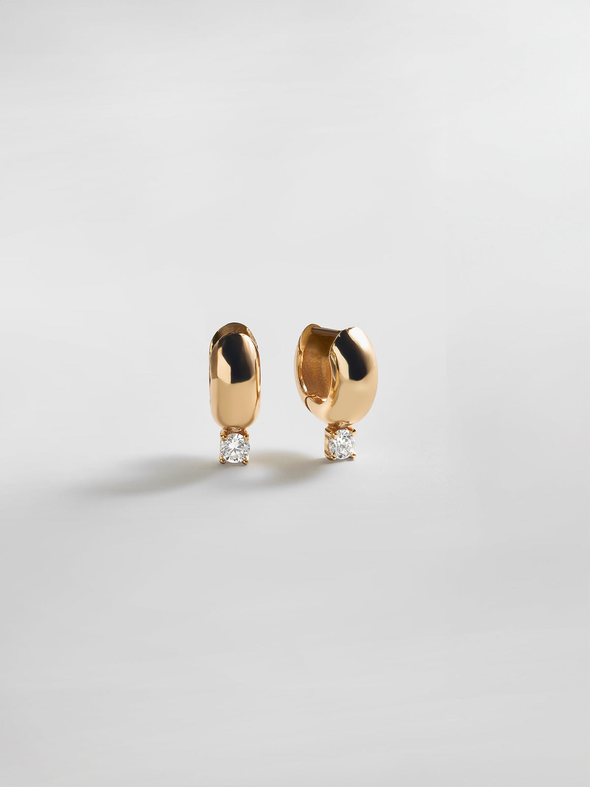 Kourtney Huggie Earrings - Kourtney Gold Plated Brass Earrings